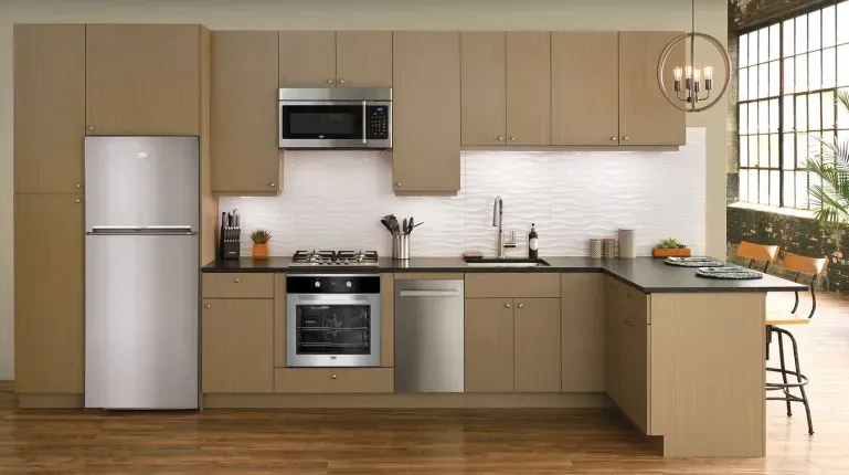 modern kitchen with tan colored cabinets